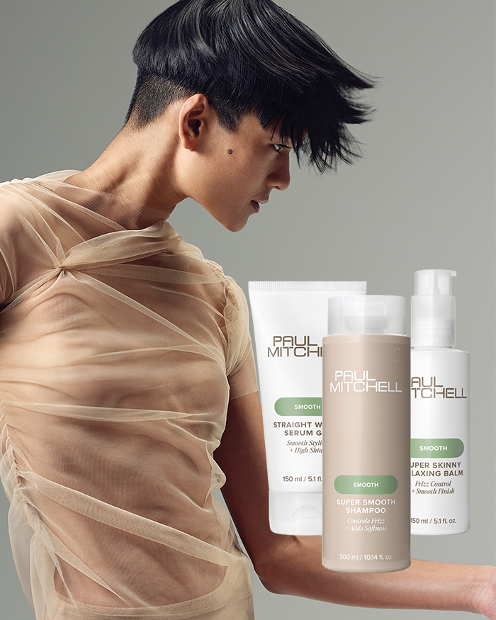 Foto eines Models mit sehr kurzem, schwarzem, glattem Haar und drei Produkten der Pflegeserie für glattes Haar von Paul Mitchell